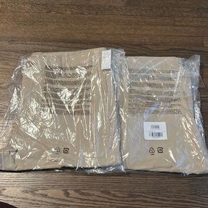 Two pairs in package of Old Navy 38 by 30 khakis.